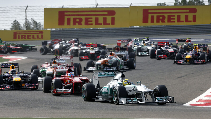 Formula One Cars Racing — Gray, Competitive, Afternoon, Photograph, Track