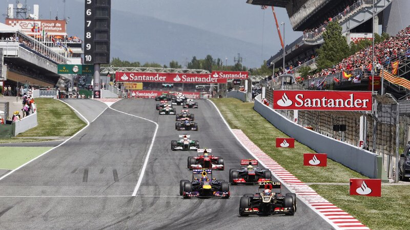 Formula One Cars Racing — Gray, Dynamic, Afternoon, Photograph, Crowd, Track