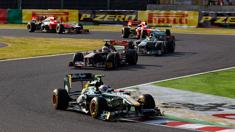 Formula One Cars Racing — Green, Dynamic, Afternoon, Photograph, Race Track, Grass