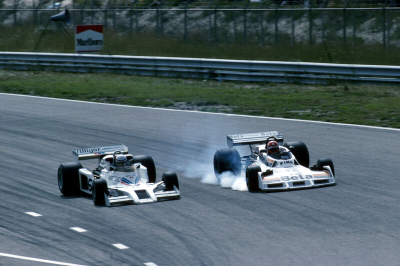 Formula One cars racing on track