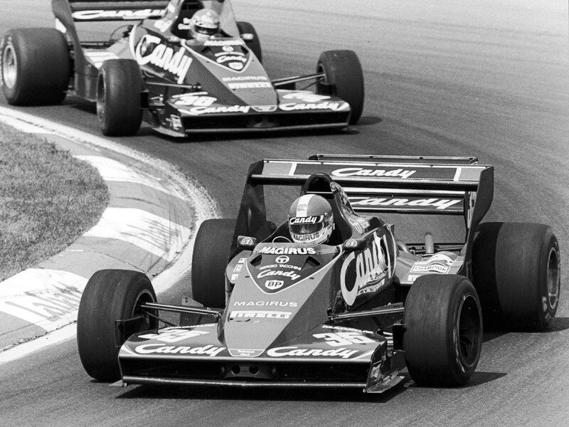 Formula One cars racing on track