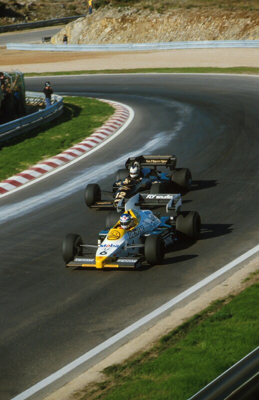 Formula One cars racing on track
