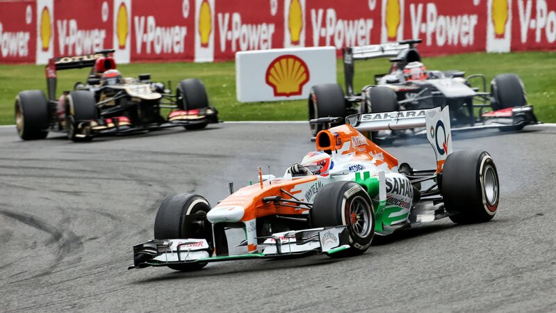 Formula One Cars Racing — Orange, Competitive, Afternoon, Photograph, Race Track
