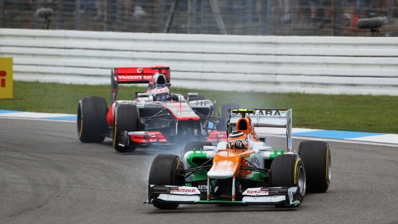 Formula One Cars Racing — Orange, Competitive, Afternoon