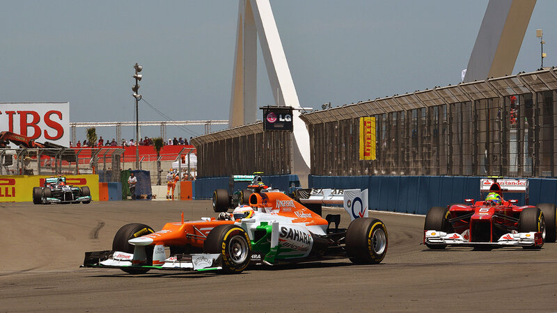 Formula One Cars Racing — Orange, Competitive