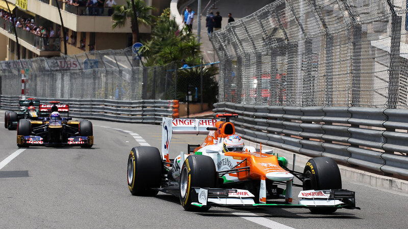 Formula One Cars Racing — Orange, Dynamic, Afternoon