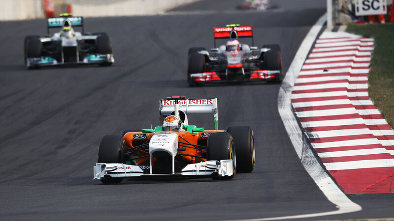 Formula One Cars Racing — Orange, Dynamic