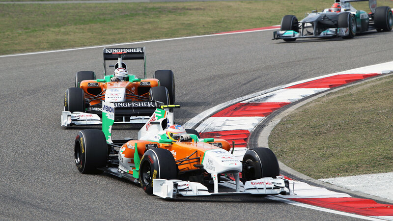 Formula One Cars Racing — Orange