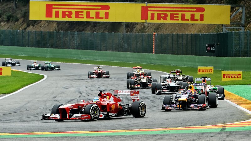 Formula One Cars Racing — Red, Competitive, Afternoon, Photograph, Track