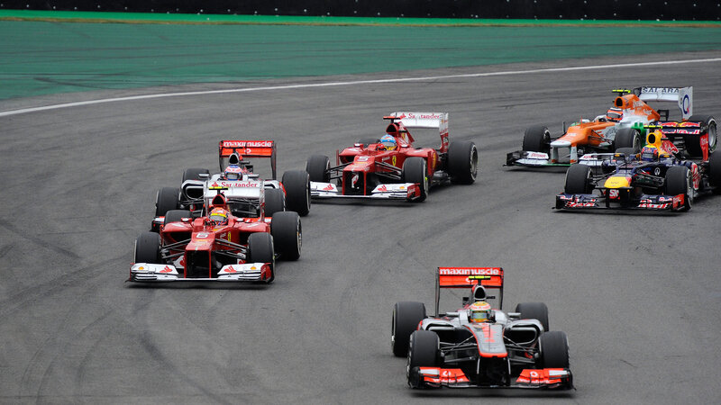 Formula One Cars Racing — Red, Competitive, Photograph, Race Track