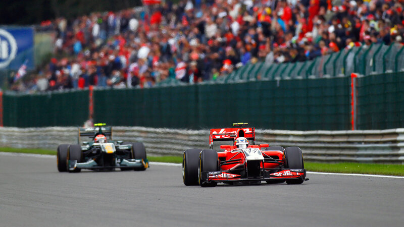 Formula One Cars Racing — Red, Dynamic, Afternoon, Photograph, Crowd, Racetrack