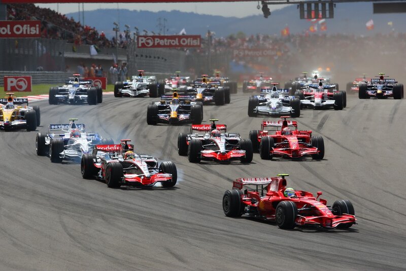 Formula One Cars Racing — Red, Dynamic, Afternoon, Photograph, Racetrack, Crowd