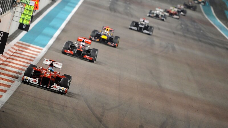 Formula One Cars Racing — Red, Dynamic, Night, Photograph, Race Track