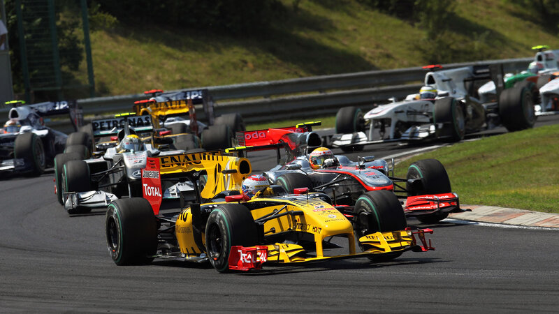 Formula One Cars Racing — Yellow, Dynamic, Afternoon