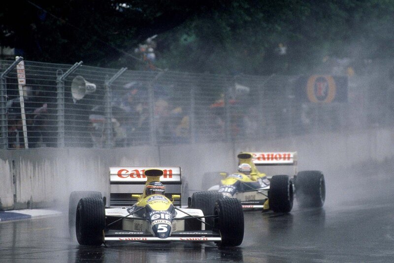 Formula One Cars Racing — Yellow