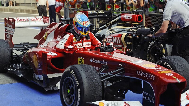 Formula One Driver in Car — Red