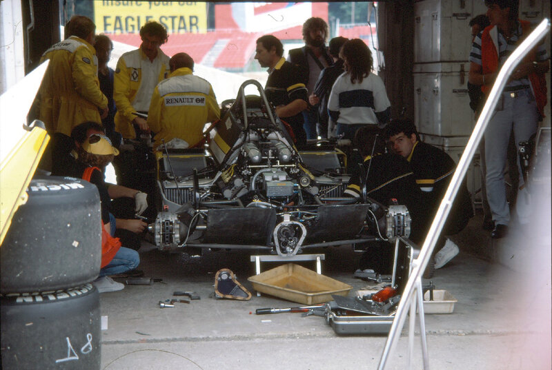 Formula One team working on car