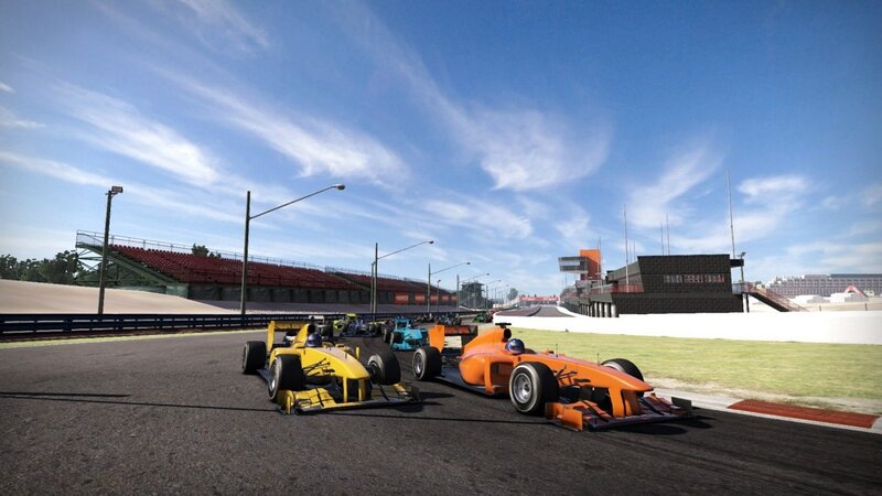 Formula Race Cars on Track — Orange