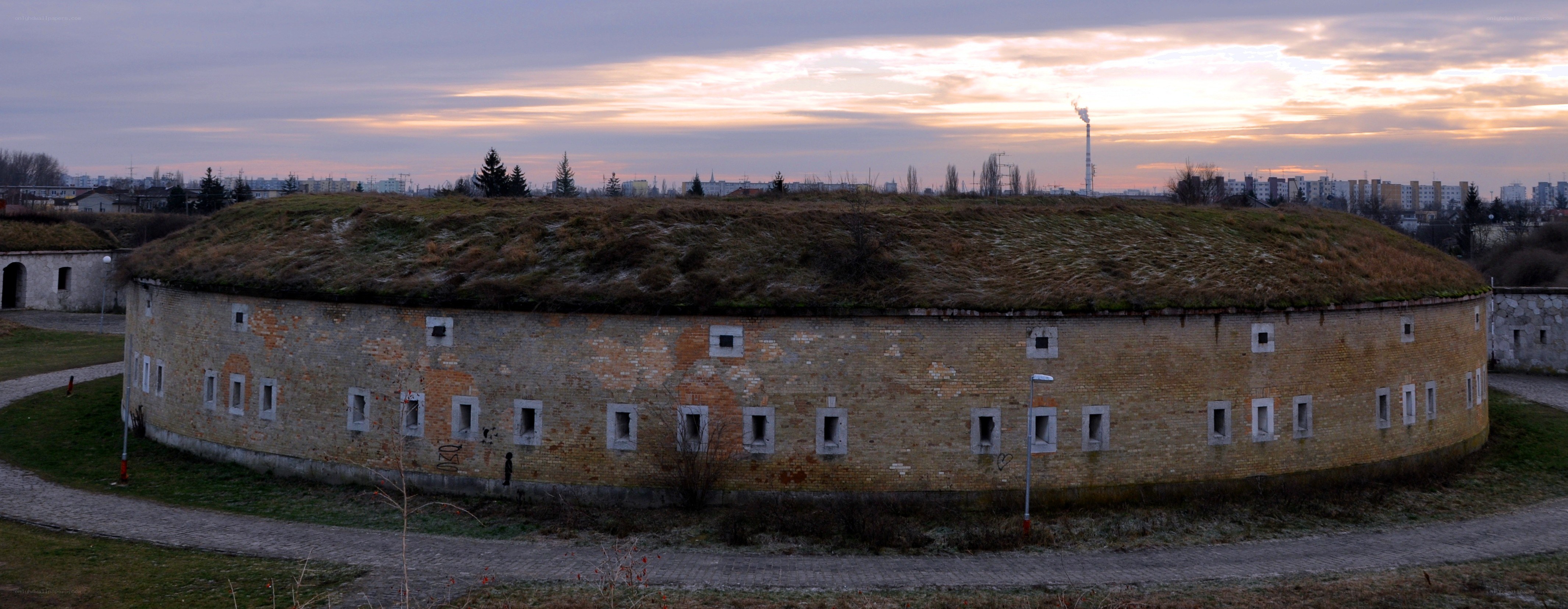 Fortified circular structure at dusk