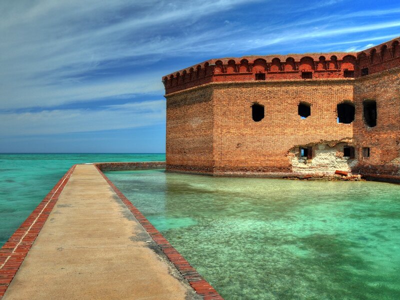 Fortress on a Pier — Blue, Serene, Afternoon, Photograph, Brick Wall