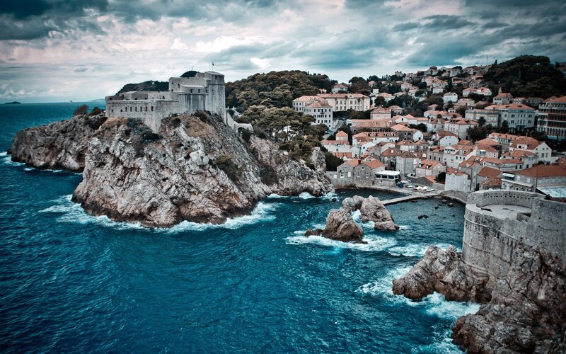 Fortress on Rocky Coast — Blue, Dramatic, Photograph