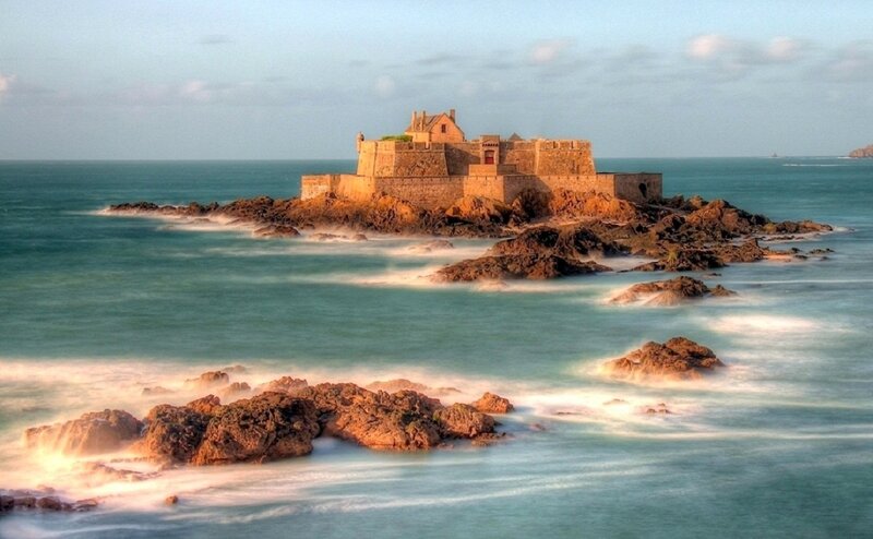 Fortress on Rocky Island — Blue, Serene, Sunset, Photograph