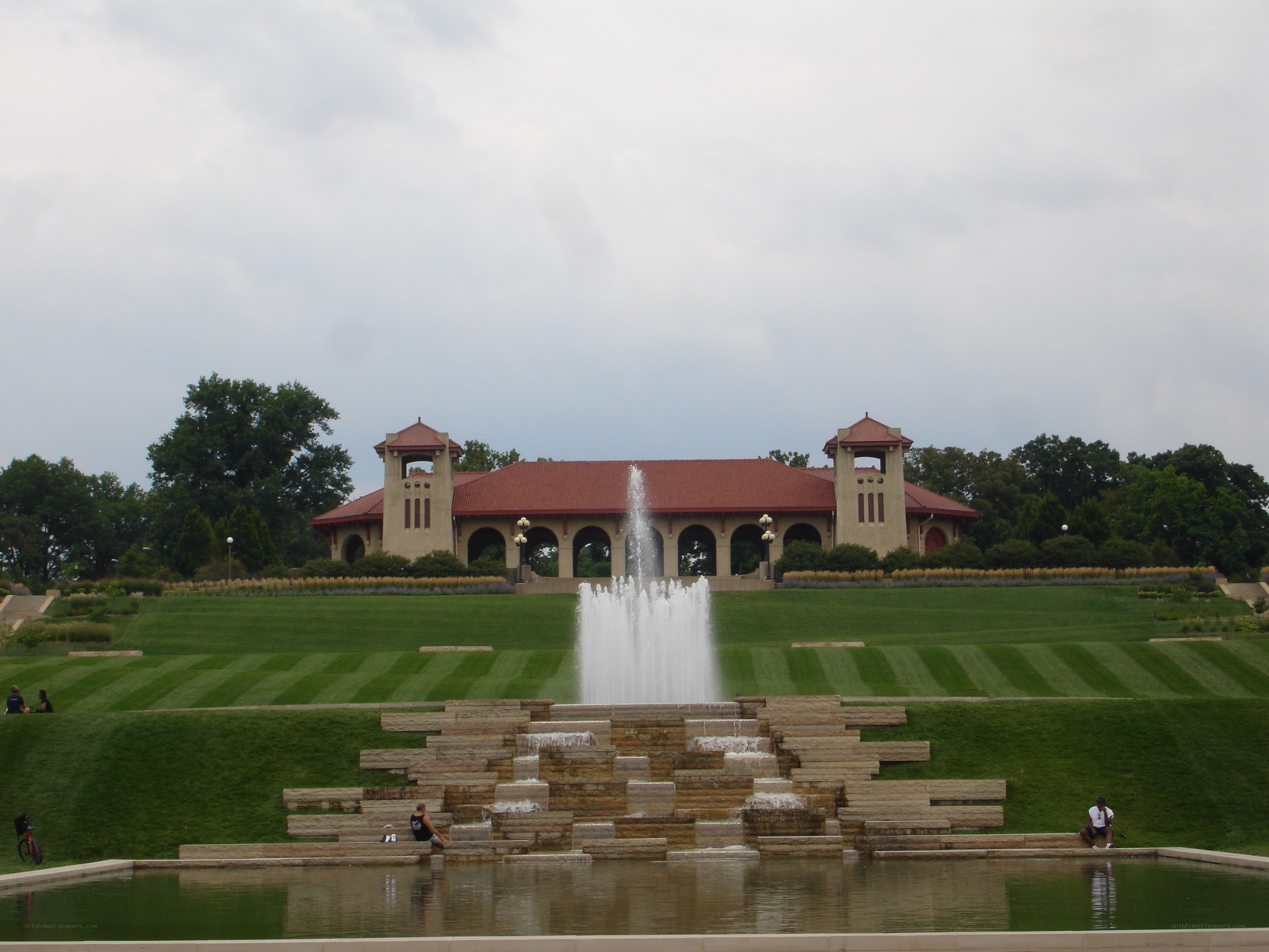 fountain and building in park