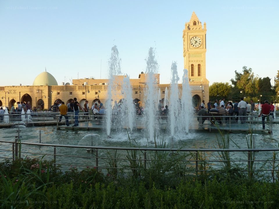 Fountain and clock tower in a public square