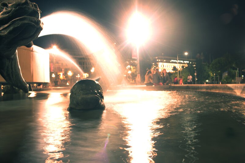 Fountain at night with water jets