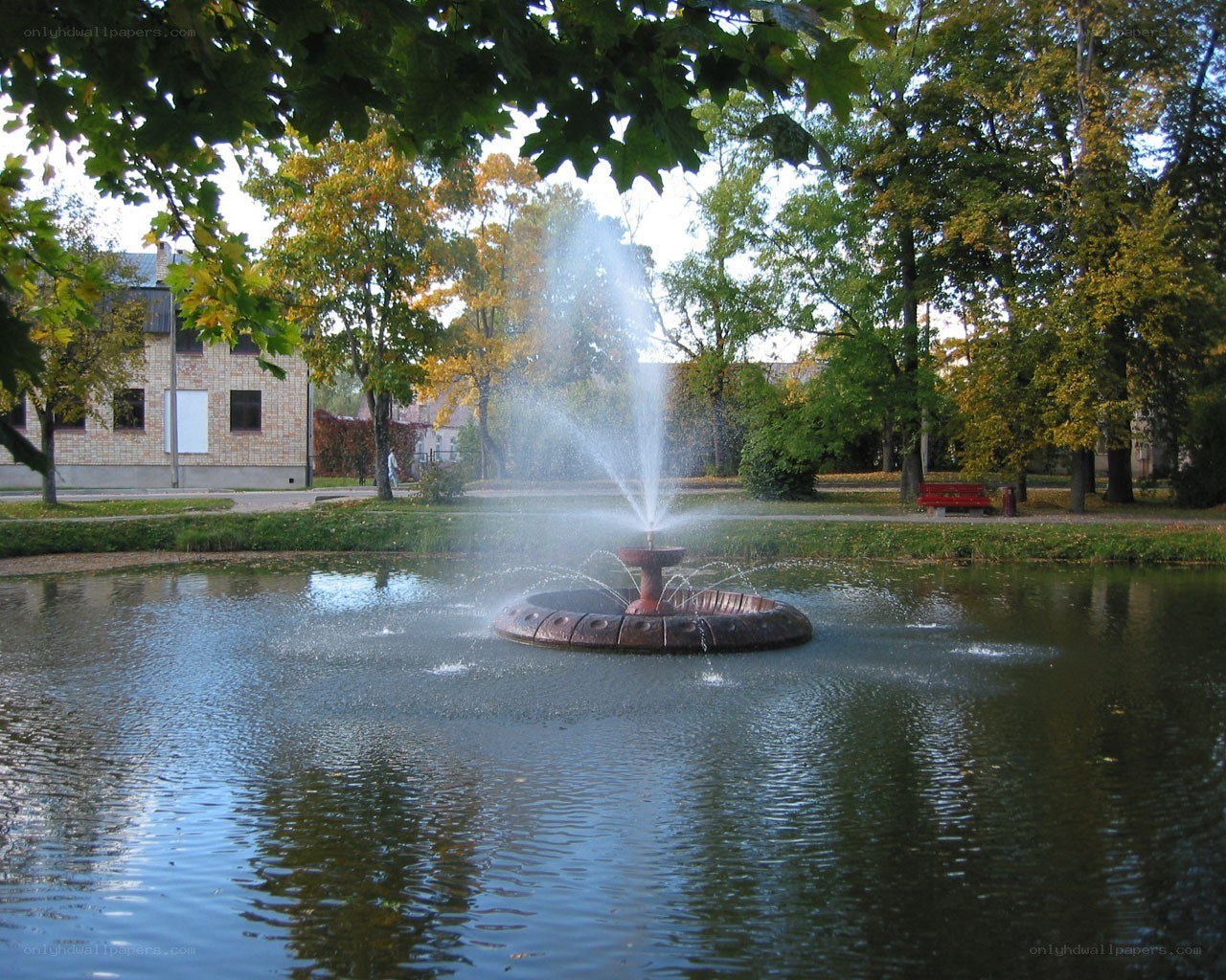 Fountain in a park pond