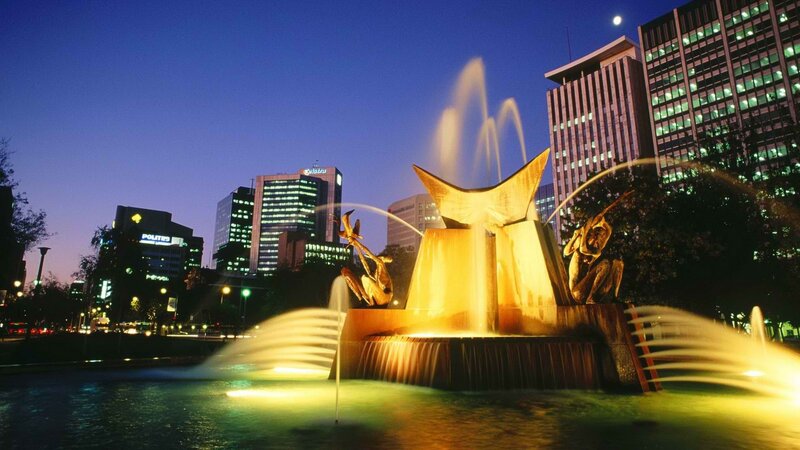 fountain in city at night
