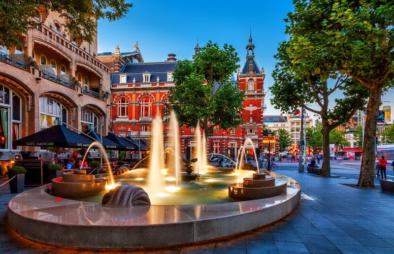 Fountain in City Square — Blue, Calm, Sunset, Photograph