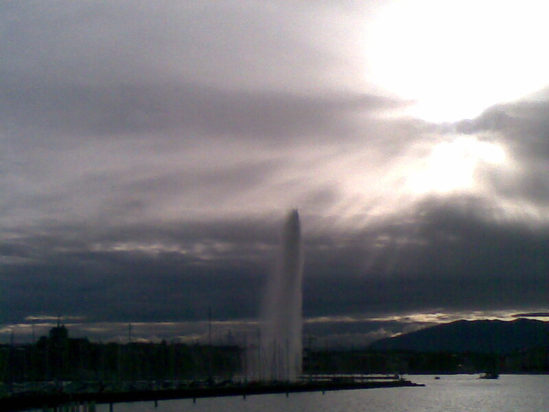 fountain in cloudy sky