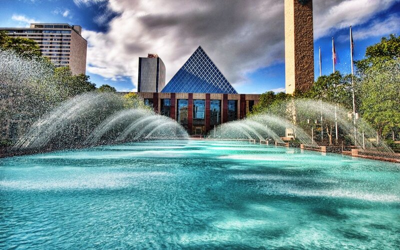 Fountain in front of pyramid building