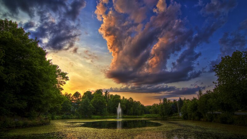 Fountain in Pond at Sunset — Blue