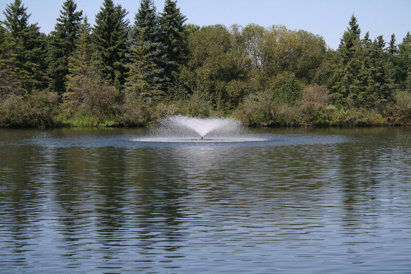 Fountain in Pond — Blue, Serene