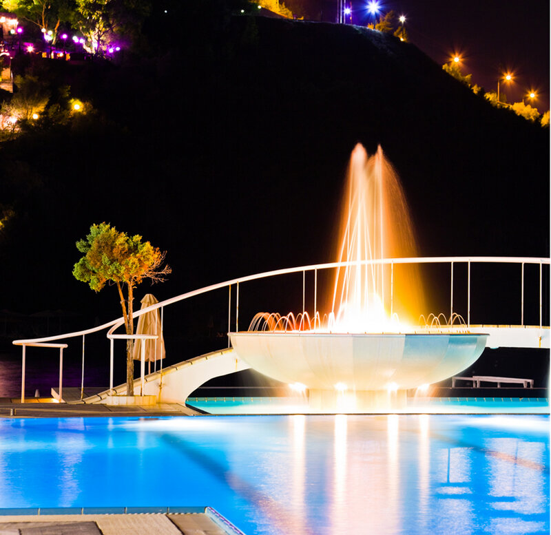 Fountain in Pool at Night