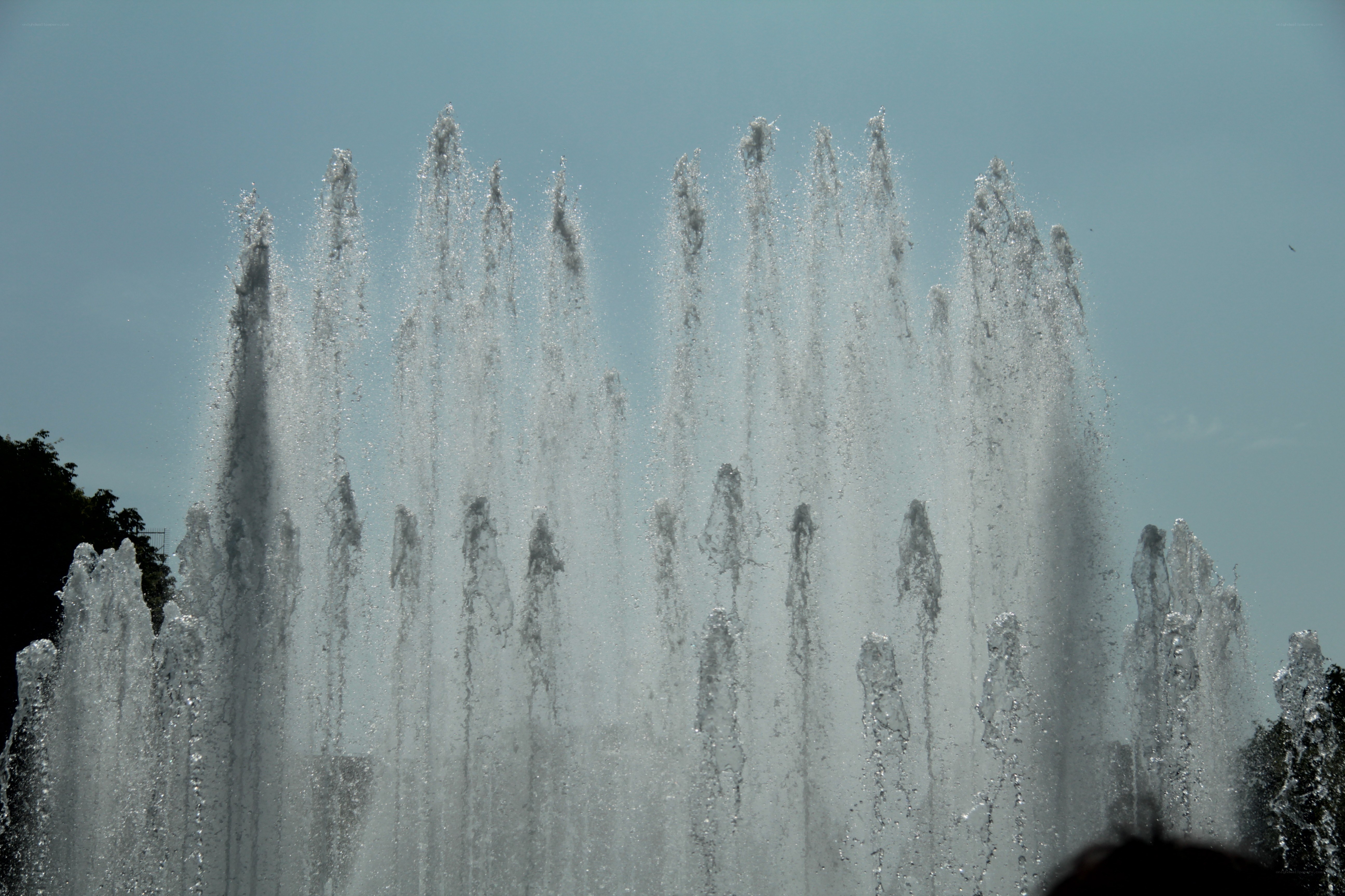 fountain jets against sky
