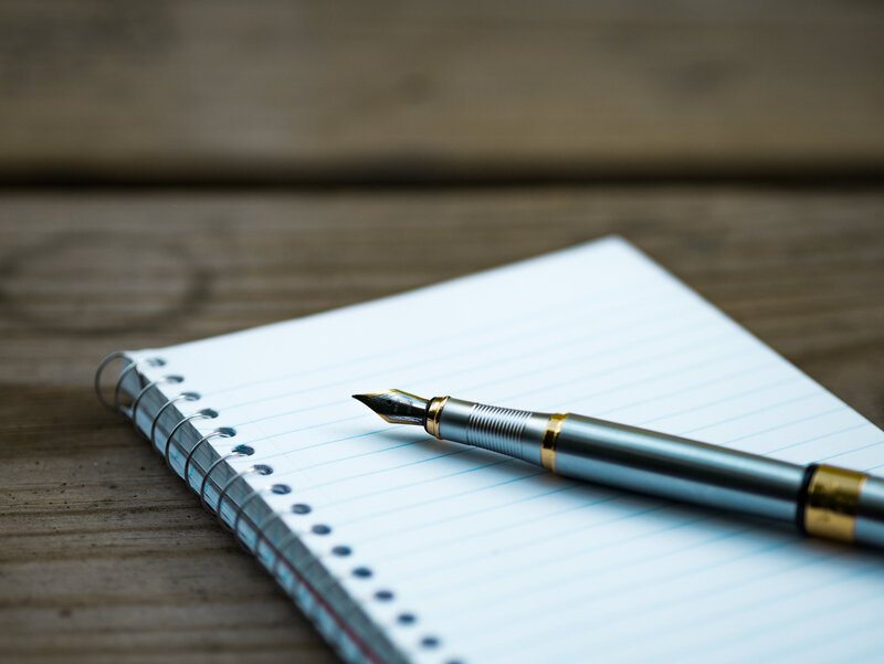 fountain pen on notebook