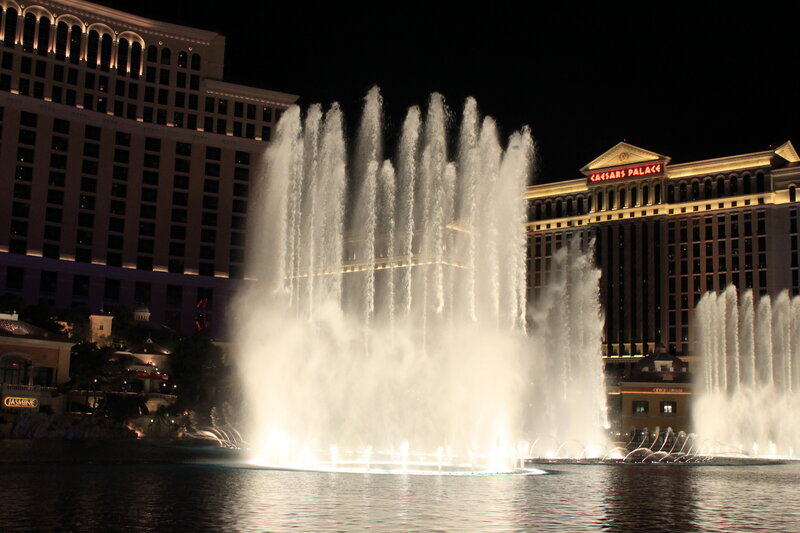 Fountain Show at Night — White, Dramatic