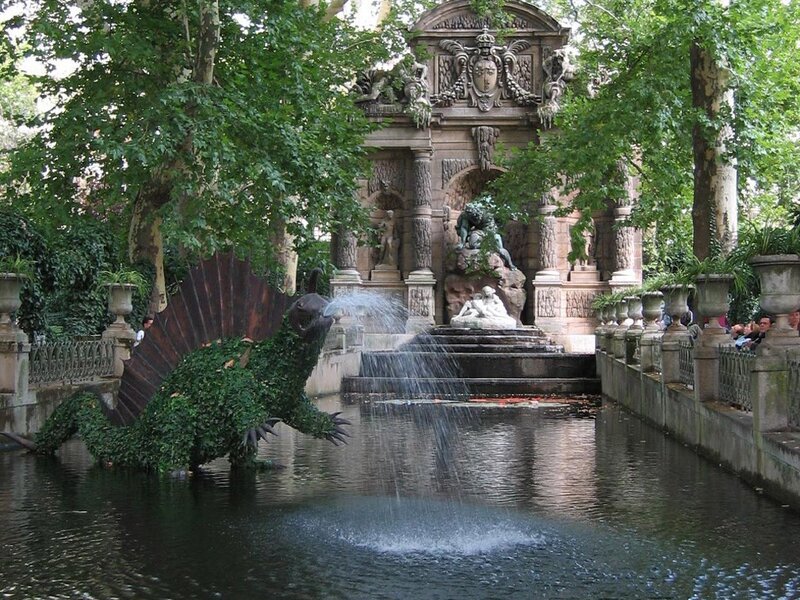 fountain with dinosaur sculpture