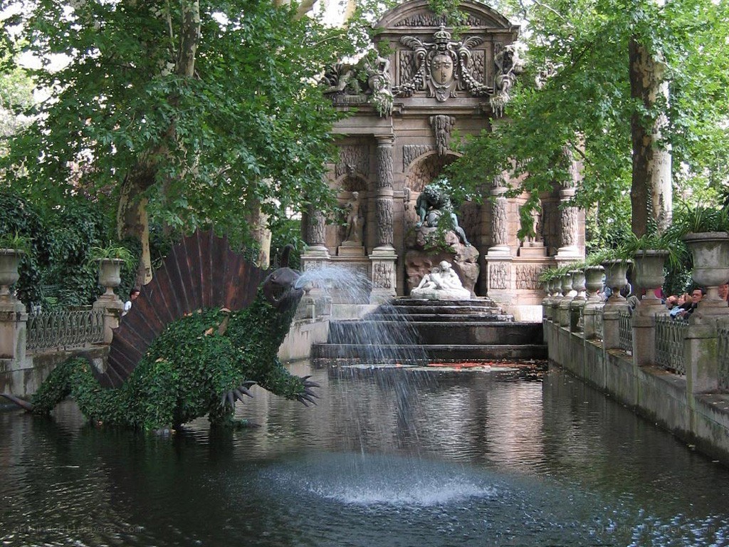 fountain with dinosaur sculpture