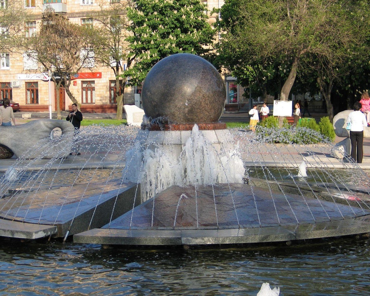Fountain with large sphere sculpture