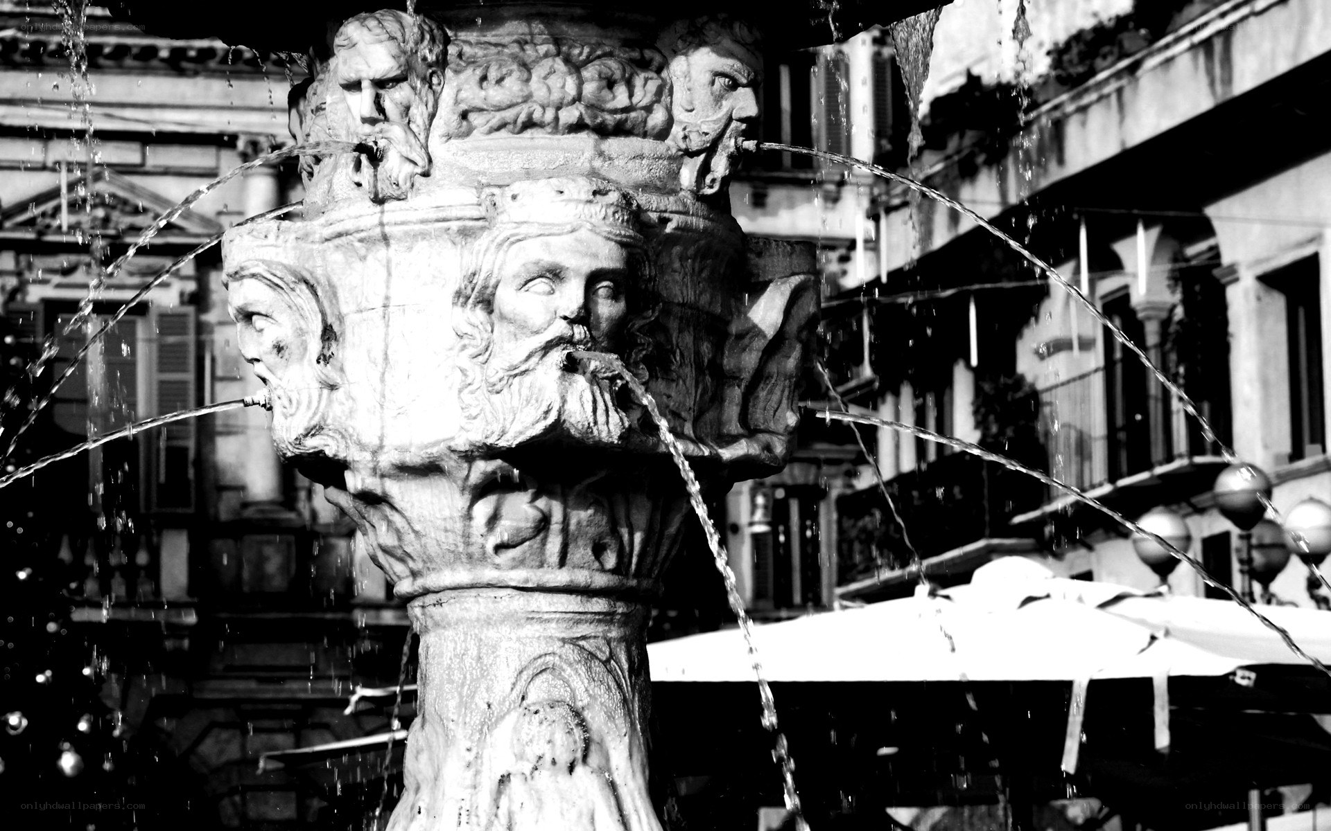 fountain with sculpted heads