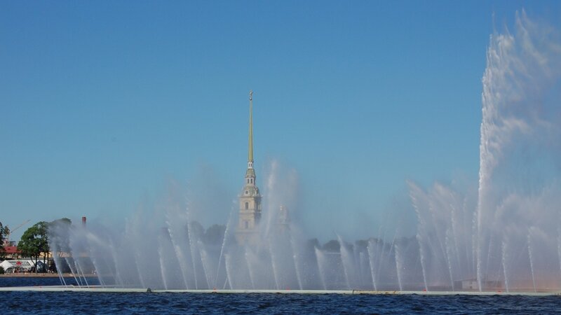 fountain with spire in background
