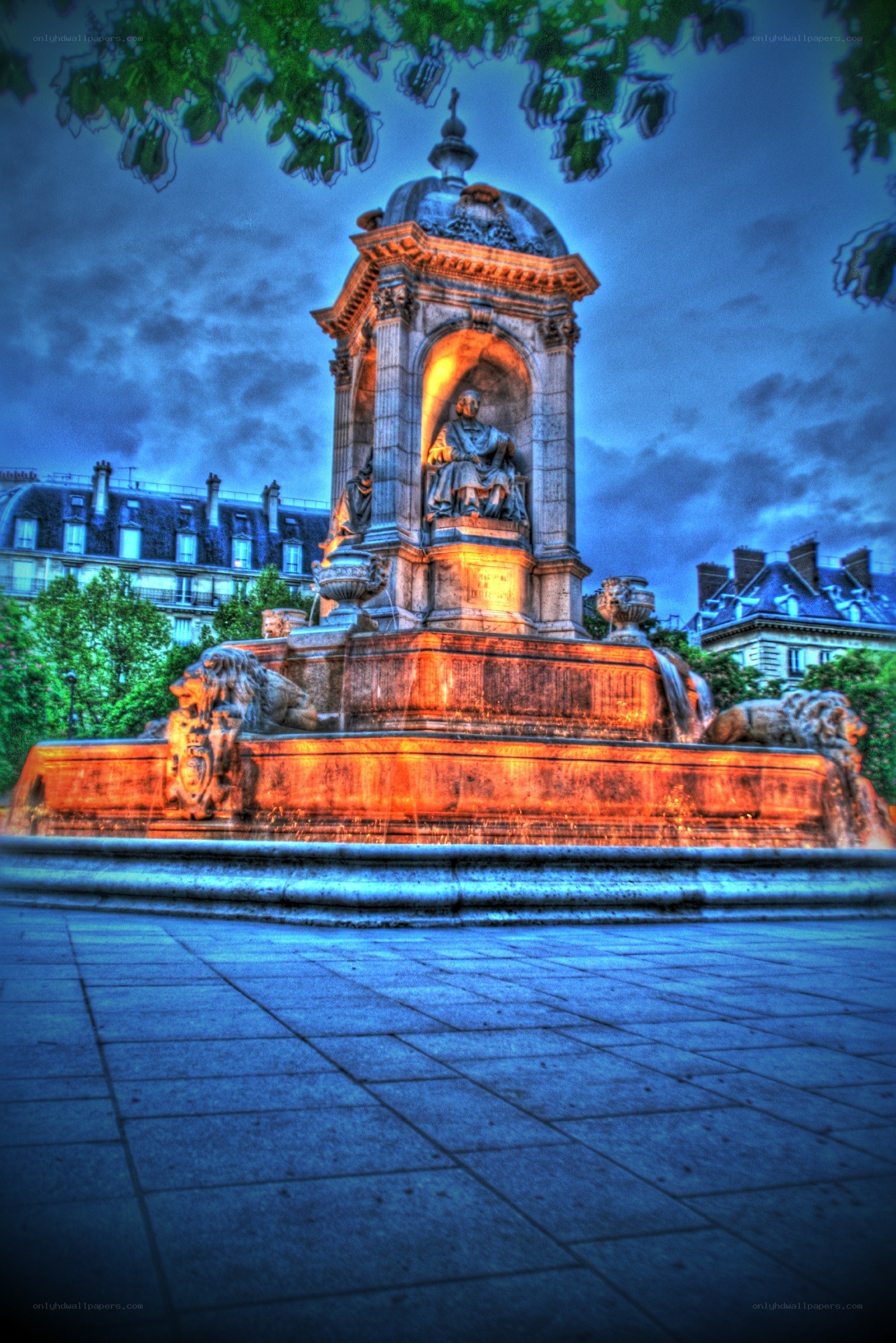 fountain with statue at dusk