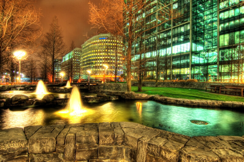 fountains in a city park at night