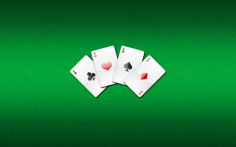 Four aces on green felt