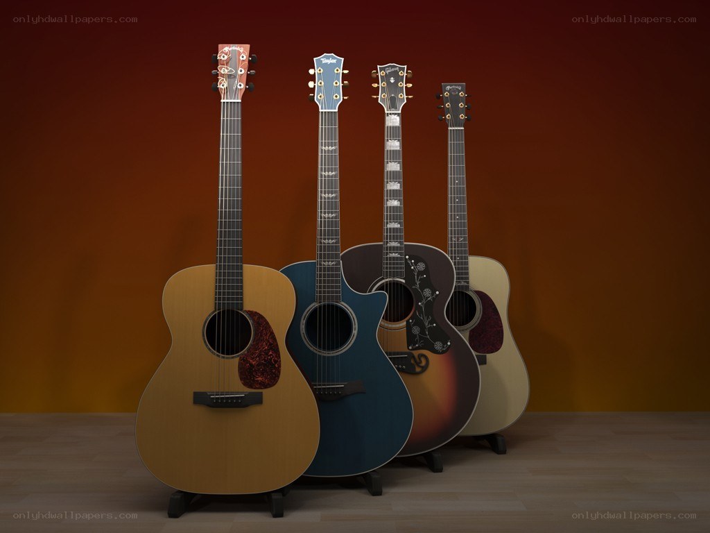 Four acoustic guitars on display