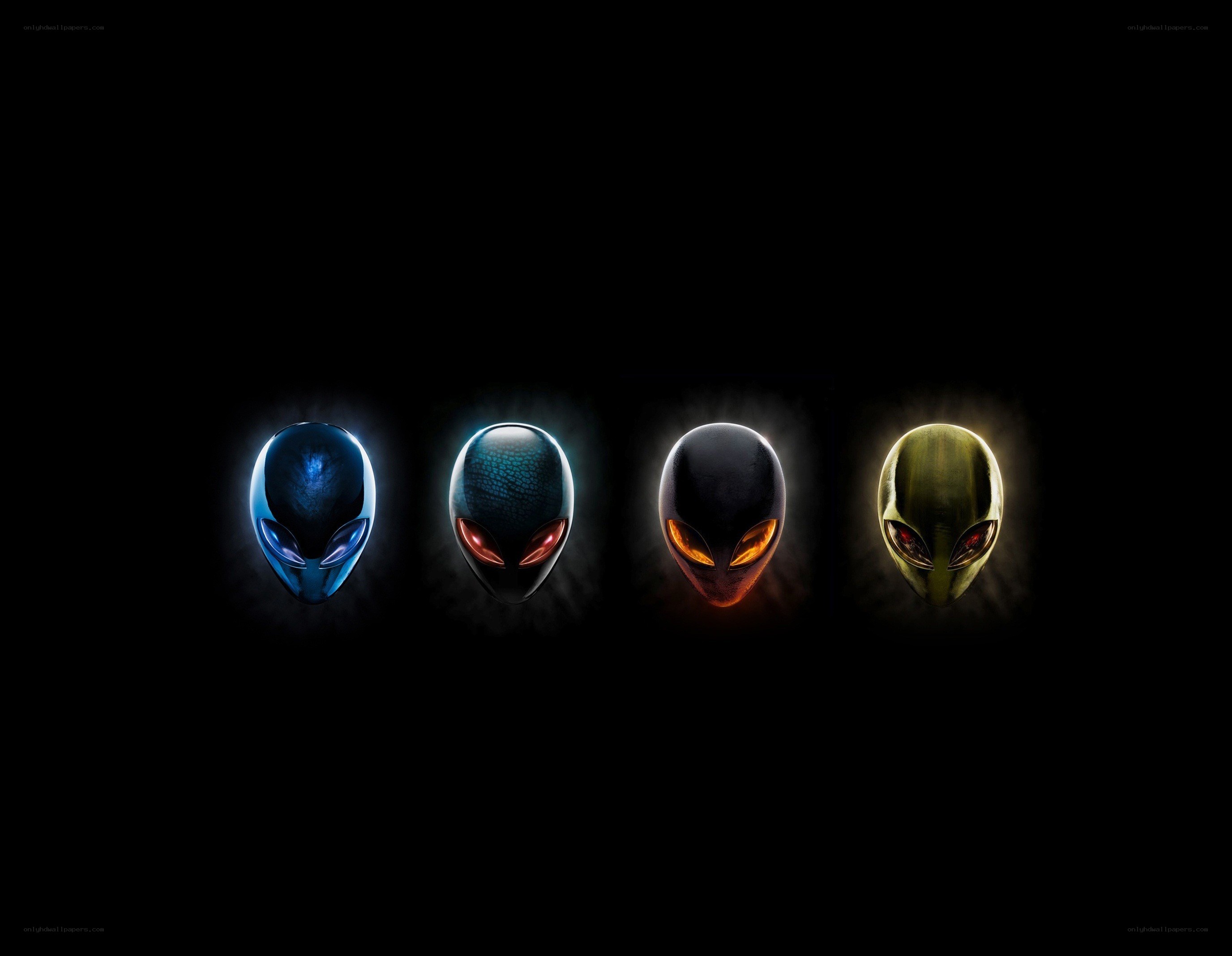 four alien heads in a row